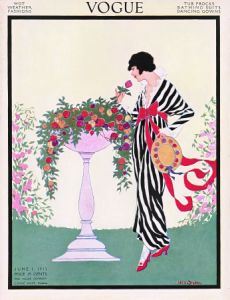 Vogue magazine cover, June 1st, 1913: Woman smelling a rose, by Helen Dryden